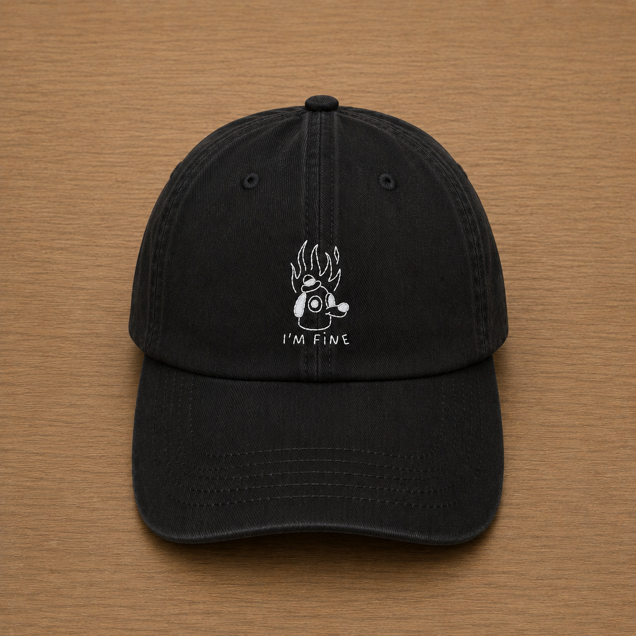Gorra color negro con meme i'm fine bordado a mano
