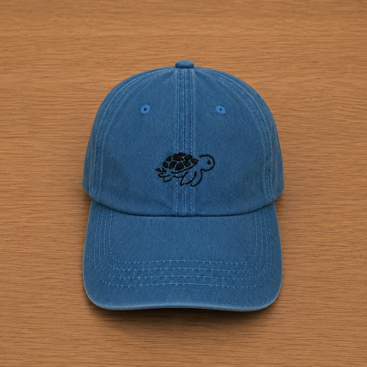 Gorra color azul con tortuga