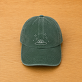 Gorra color verde bosque con ovni bordado a mano