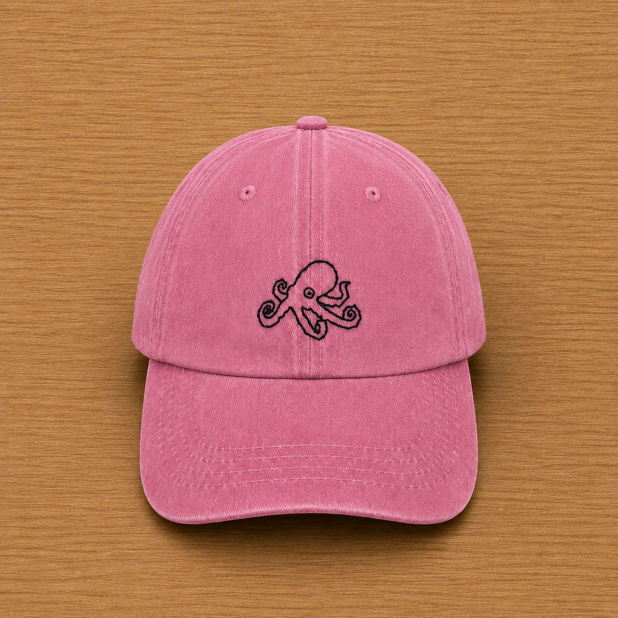 Gorra color rosa con pulpo